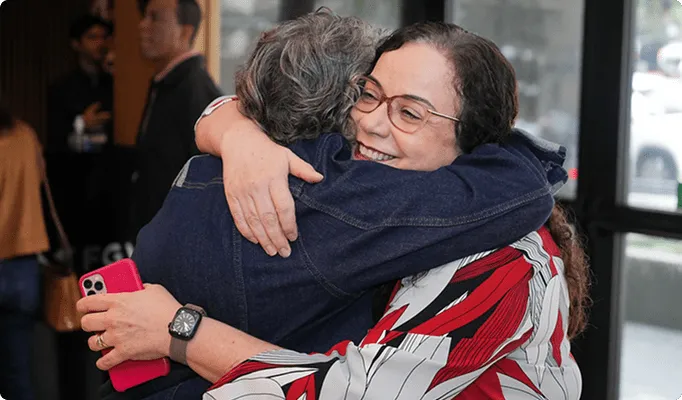 Women embracing
